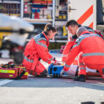 Paramedics providing first aid