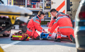 Paramedics providing first aid