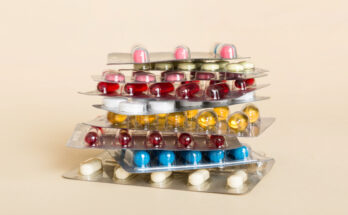 too many different pill cartridges stacked. selective Focus. Packs of blister pills with tablets. Colored pastilles packages. A pile of medicine in blister packs. Pharmaceutical blister packs